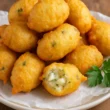 zeppoline di baccalà, ricetta zeppole di baccalà, antipasto vigilia di Natale, ricette natalizie, frittelle di baccalà, cucina tradizionale napoletana, antipasti di pesce, ricette facili Natale copia