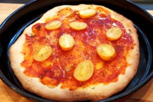 Pizza gourmet con pomodori secchi