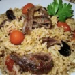 riso con acciughe pomodorini e mollica tostata