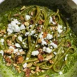 Pesto di Basilico Profumato al Limone con Feta Greca e Noci Tostate sulla Brace