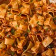 pasta totani olive e capperi alla puttanesca
