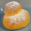 Una brioche con la pallina o tuppo morbida con una nuvola